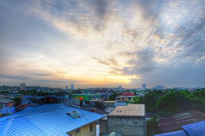 High angle view of city at sunset