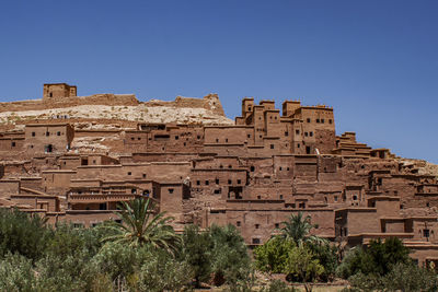 Traditional mud-built berber village. kasbahs in marrakech in the atlas mountains, morocco, africa.
