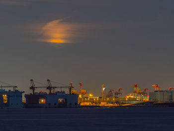 Moonset and tokyo port