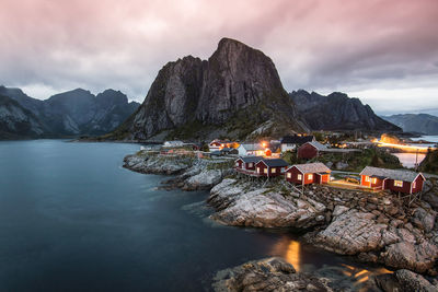 Scenic view of illuminated mountains against sky