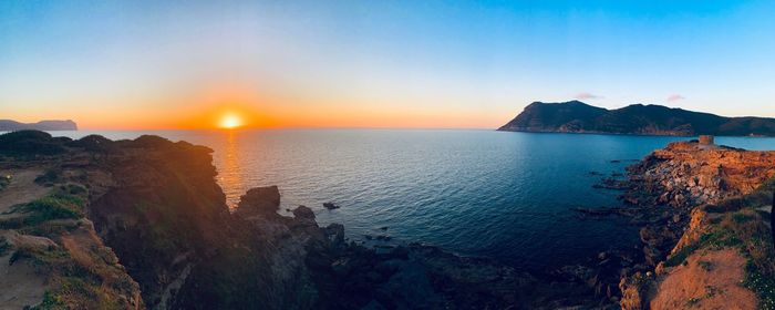 Scenic view of sea against sky during sunset