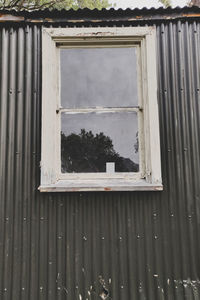 Window of old abandoned building