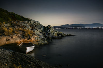 Scenic view of sea against sky at sunset