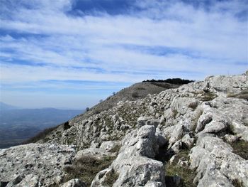 Scenic view of rocky mountains against sky