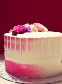 Close-up of pink roses against white background