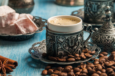 Close-up of coffee cup on table
