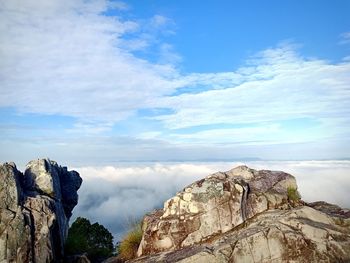 Panoramic view of rocks and mountains against sky