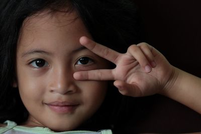 Close-up portrait of smiling girl