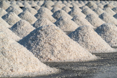 Close-up of stones on sand