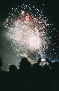 Firework display at night