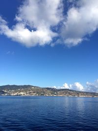 Scenic view of sea against cloudy sky