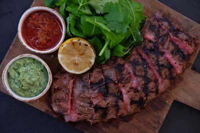 High angle view of meat on cutting board