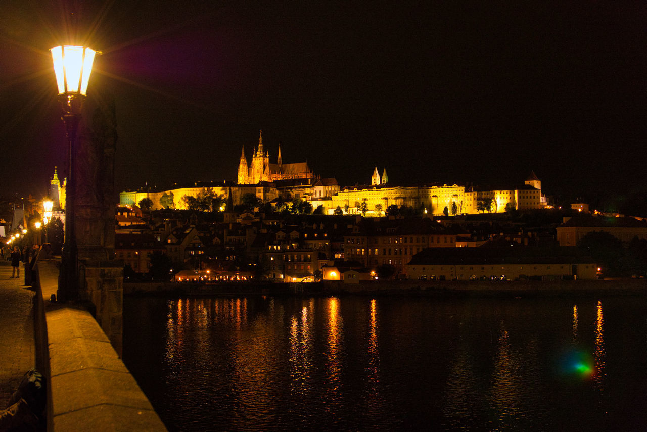 night, architecture, illuminated, built structure, building exterior, water, city, travel destinations, sky, reflection, evening, dusk, river, light, nature, no people, travel, building, street light, bridge, history, the past, lighting equipment, transportation, tourism, religion, outdoors, street, cityscape, darkness, place of worship