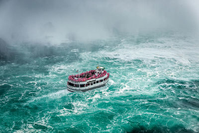 Boat sailing in sea