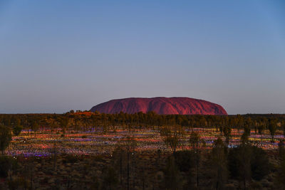 Scenic view of land against clear sky