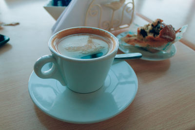 Close-up of coffee cup on table