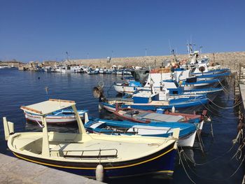 Boats moored in harbor