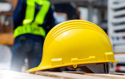 Midsection of man working in factory