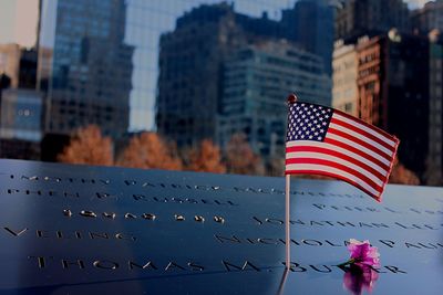 Close-up of flag against one tower