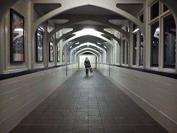 People walking in tunnel