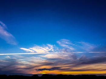 Low angle view of cloudy sky during sunset