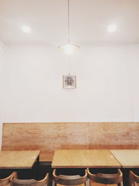 Illuminated light bulb on table in restaurant