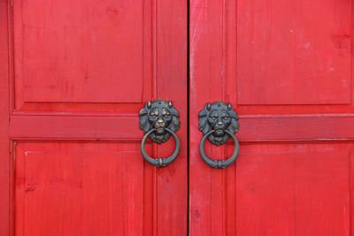 Close-up of closed red door