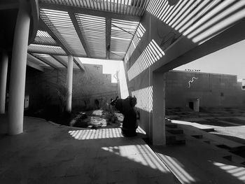 People walking on sidewalk in city