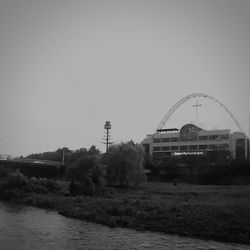 Amusement park against clear sky