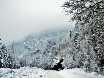 Scenic view of mountains against sky during winter