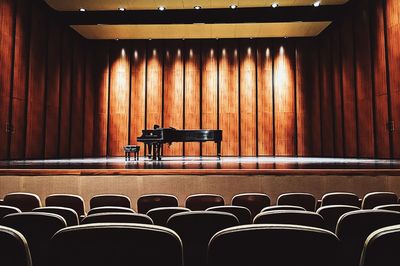 Empty chairs at auditorium