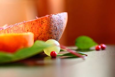 Close-up of orange fruit on table