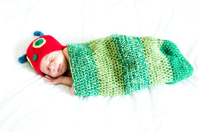High angle view of laundry on bed