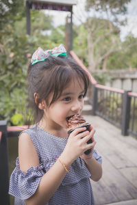Portrait of a girl holding ice cream