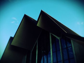 Low angle view of building against blue sky