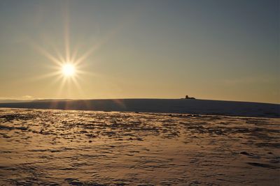 Scenic view of sea against sky at sunset