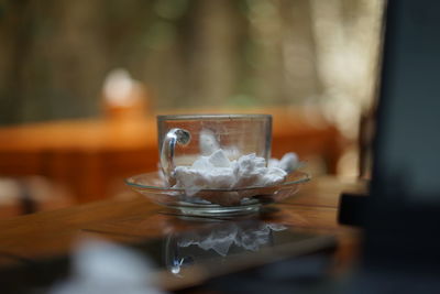 Close-up of tea cup on table