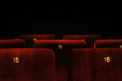 View of red seats in shelf