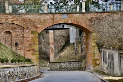 View of old bridge above street