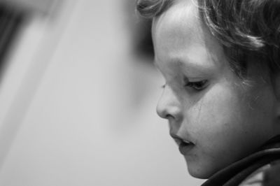 Close-up portrait of woman looking away