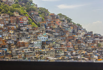 Buildings in city against sky