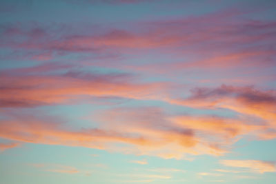 Low angle view of orange cloudy sky