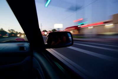 Blurred motion of car on road