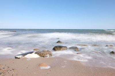 Scenic view of sea against clear sky