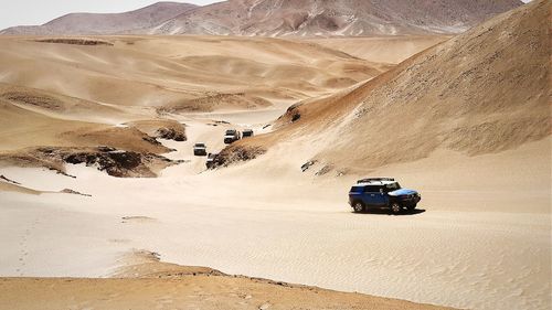 Off road vehicle in desert