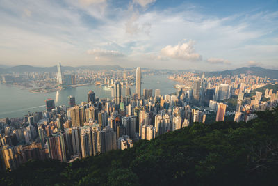 Panoramic view of city buildings against sky