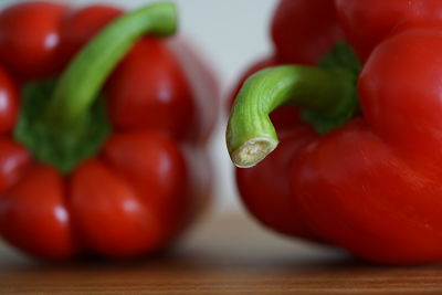 Close-up of red bell peppers on table