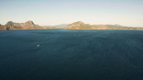 Bay and the tropical islands. seascape with tropical rocky islands, ocean blue wate, aerial view. 