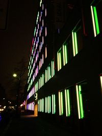 Low angle view of illuminated building at night