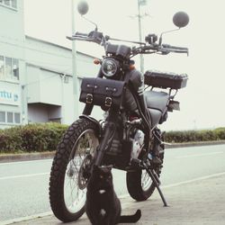 Close-up of bicycle parked on road